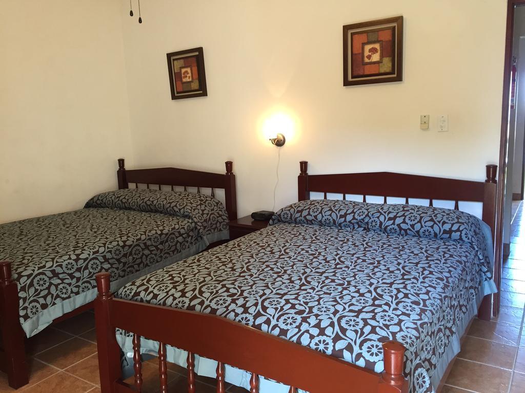 Panchos Villas Caye Caulker Rom bilde
